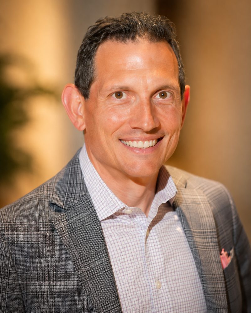 Portrait of Josh Wagner, founder and managing director of Stratosphere Capital